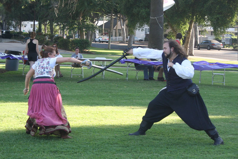 Members demonstrating fighting at activities fair